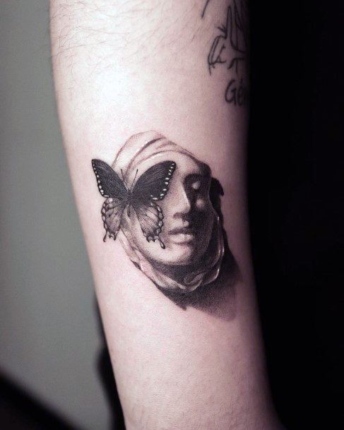 Ravishing Statue Tattoo On Female