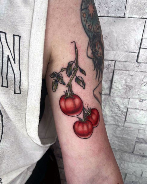 Ravishing Tomato Tattoo On Female