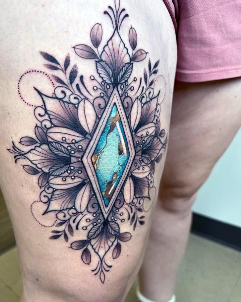 Ravishing Turquoise Tattoo On Female