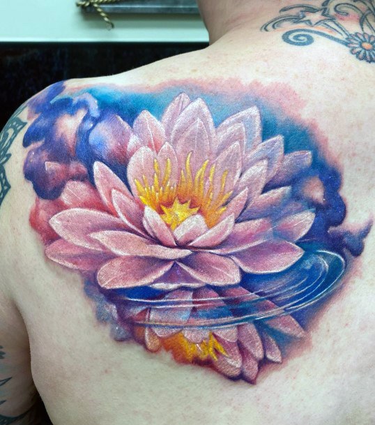 Ravishing Water Lily Tattoo On Female