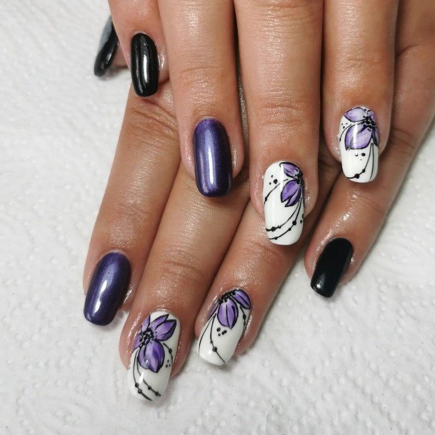 Ravishing White And Purple Nail On Female