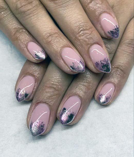 Razor Ended Silver Nails With Light Pink Polish