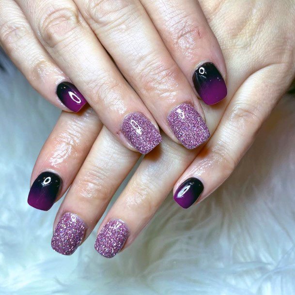 Razzling Dazzling Black And Purple Glossy Sparkling Nail Design Inspiration For Ladies