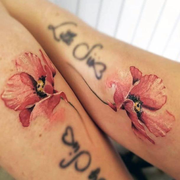 Realistic Hibiscus Sister Tattoo On Forearms