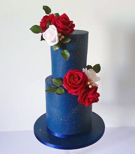 Red And White Roses On Blue Wedding Cake