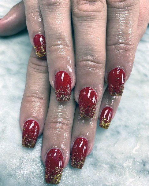 Red Nails Dipped In Gold For Women