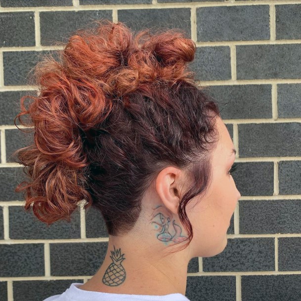 Redhead Woman With Long Curly Locks Pulled Up Mohawk Style Hair