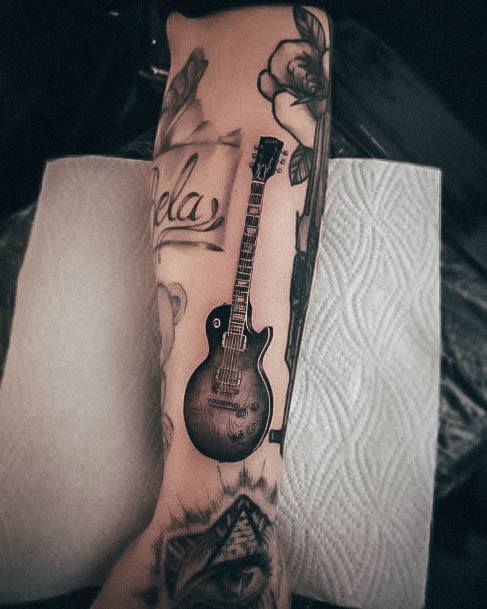 Remarkable Womens Guitar Tattoo Ideas