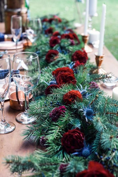 Rich Greens And Red Roses Christmas Wedding Flowers