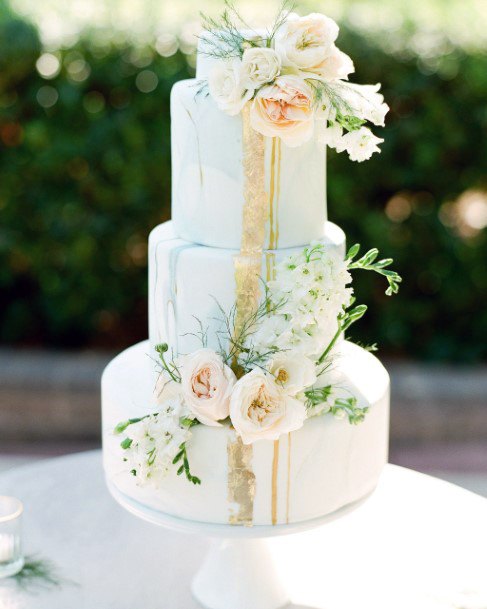 Rich White Wedding Cake With June Flowers