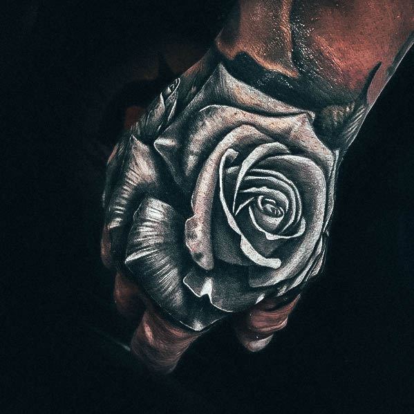 Rose Hand Womens Tattoo Designs