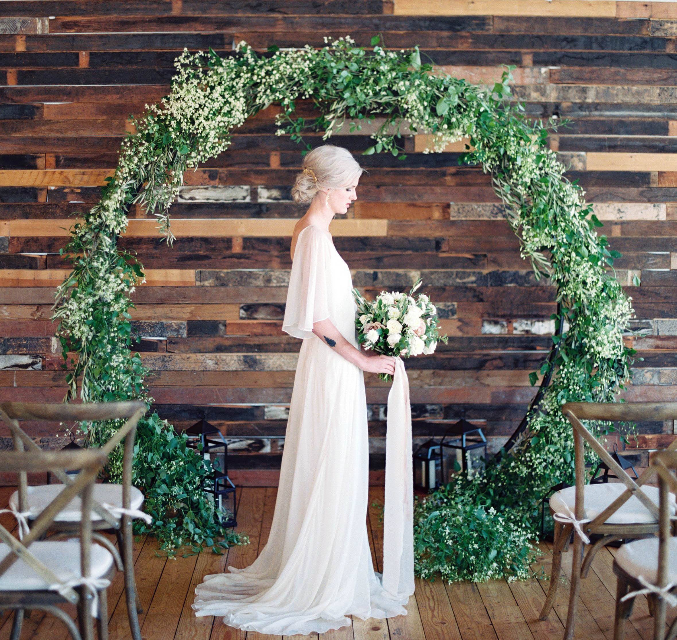 Round Green Lush Wedding Arch Flowers