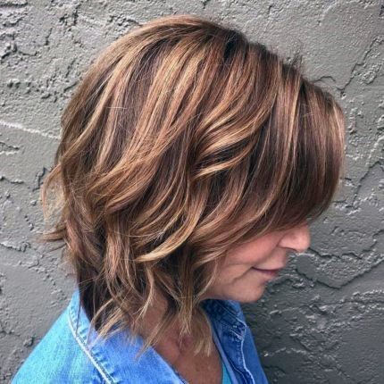 Rugged Ends Long Bob Hairstyle For 50 Year Old Woman With Thick Hair