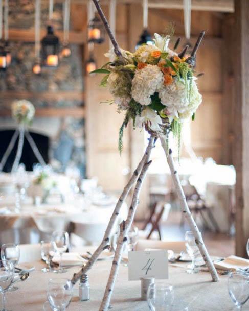 Rustic Wedding Decor With Twigs And Flowers