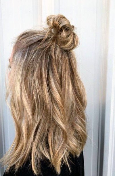 Sandy Blonde Female Shoulder Length Wavy And Messy Hair Knot