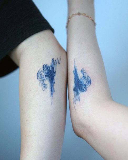 Scribble Waves Tattoo Blue Womens Hands