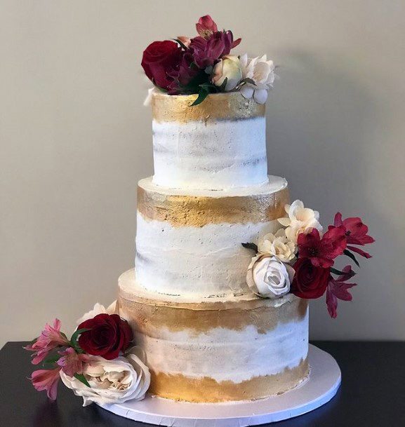 Scrumptious Gold And White Wedding Cake