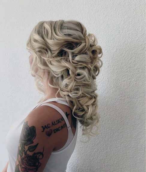 Scrunchy Platinum Curls Hairstyle Women