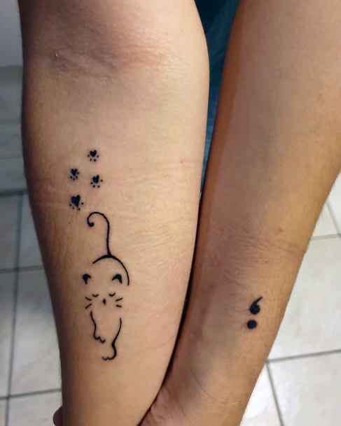 Semi Colon And Paw Prints Kitty Tattoo Womens Ankles