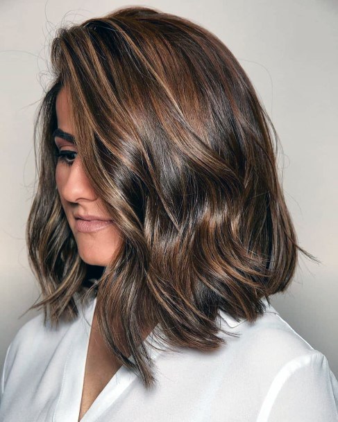 Sexy Layered Highlighted Glossy Mid Length Natural Hair Looks For Women
