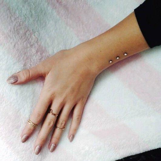 Sexy Vertical Wrist Dermal Design Piercing Ideas For Women