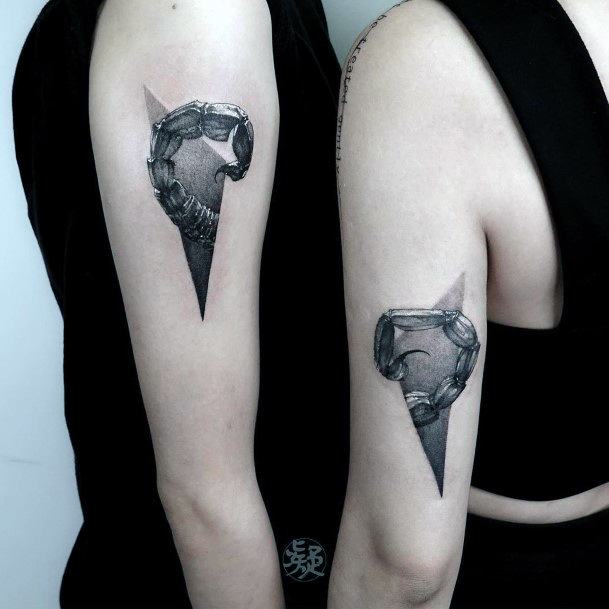 Shaded Triangle And Scorpion Tattoo Womens Arms