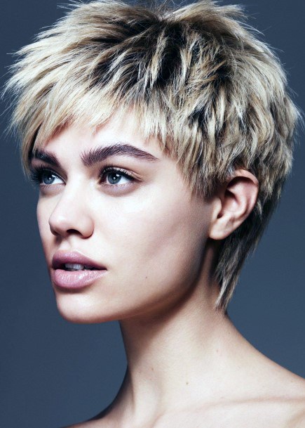 Shaggy Undercut On Girl With Edgy Hairstyle Medium Blonde