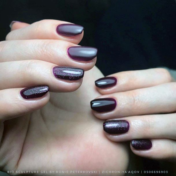 Shimmering Dark Purple Nails Women