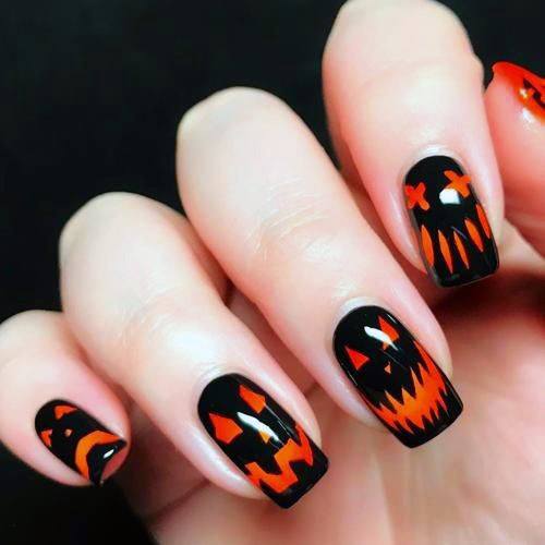 Shiny Black And Orange Scary Pumpkin Nails For Women