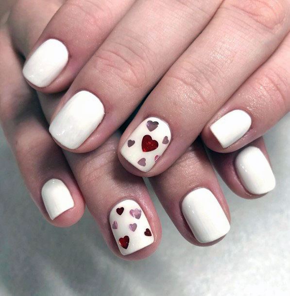 Shiny Red Hearts On White Gel Nails