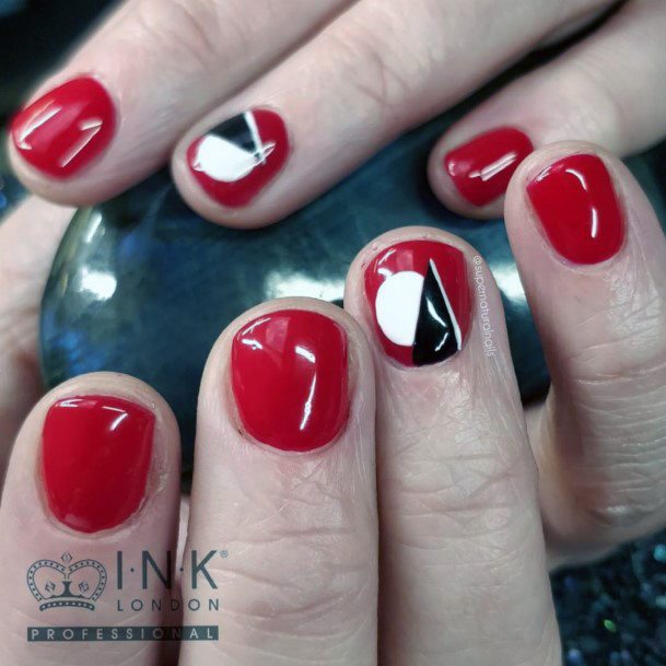 Short Red Nails With Black And White Design For Women