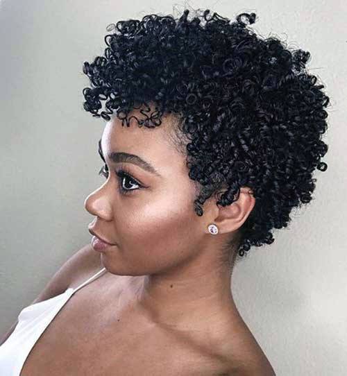 Short Tight Sexy Curls Twisted On Natural Dark Hair Of Female