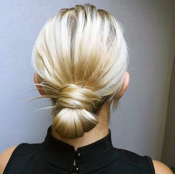 Shoulder Length Blonde Hair Pulled Into Low Neck Hair Knot