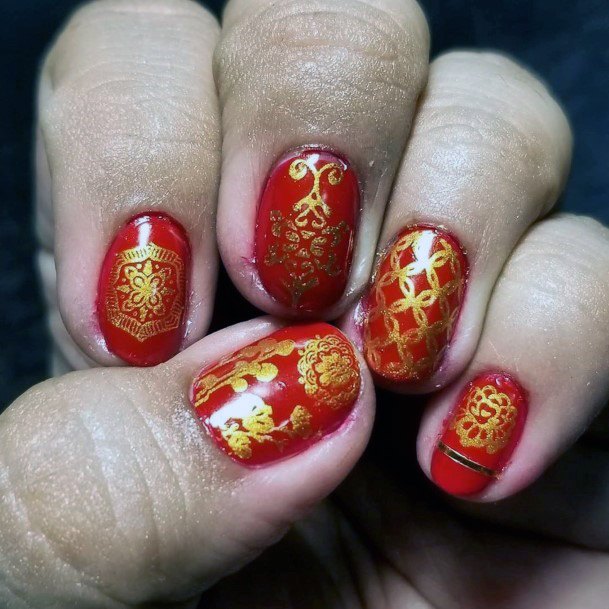 Showy Red And Gold Nails Women