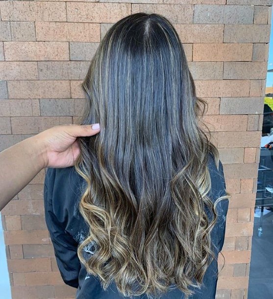 Silky Brunette Balayage For Women Looking For A Dark Glamour