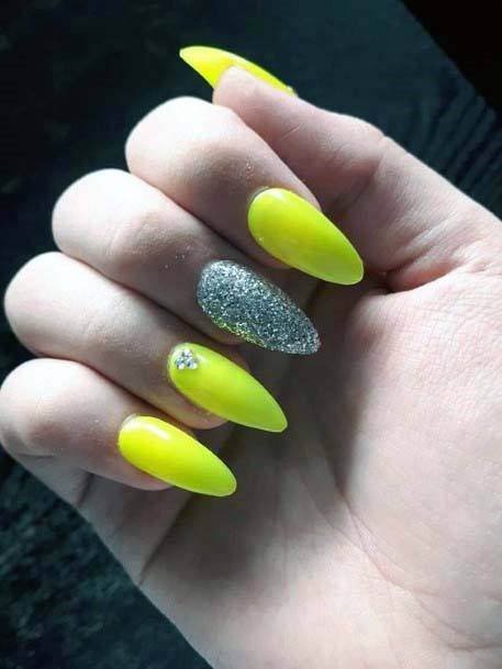 Silver Sparkles And Bright Yellow Nails For Women
