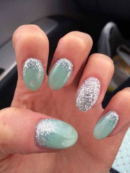 Silvery Glitters On Light Green Nail