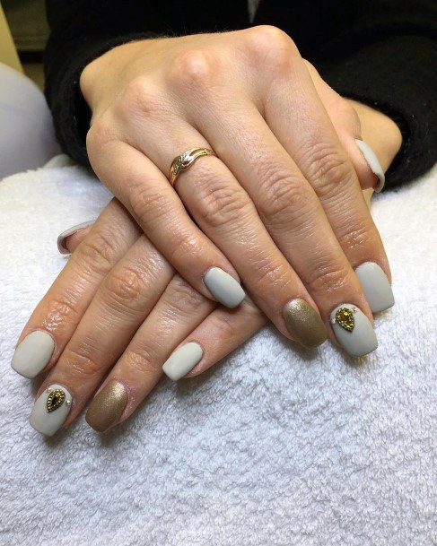 Silvery Grey Nails With Golden Embossed Art Women