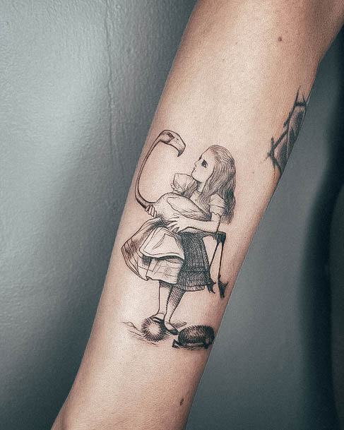 Simple Alice In Wonderland Tattoo For Women