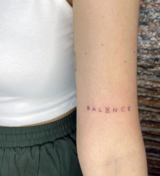 Simple Balance Tattoo For Women