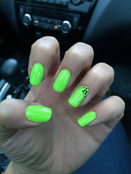 Simple Black Floral Art On Neon Green Nails