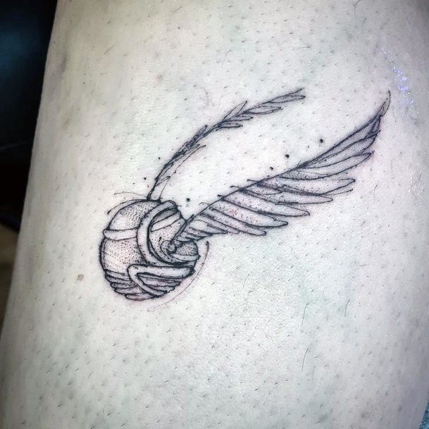 Simple Golden Snitch Tattoo For Women