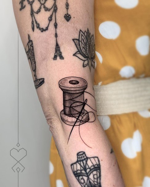 Simple Needle And Thread Tattoo For Women