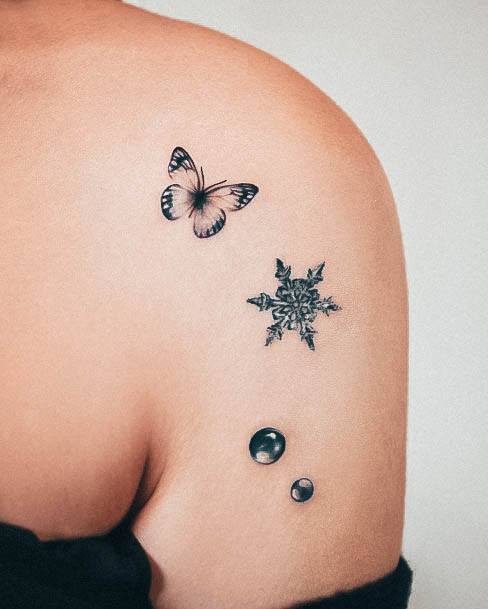 Simple Snowflake Tattoo For Women