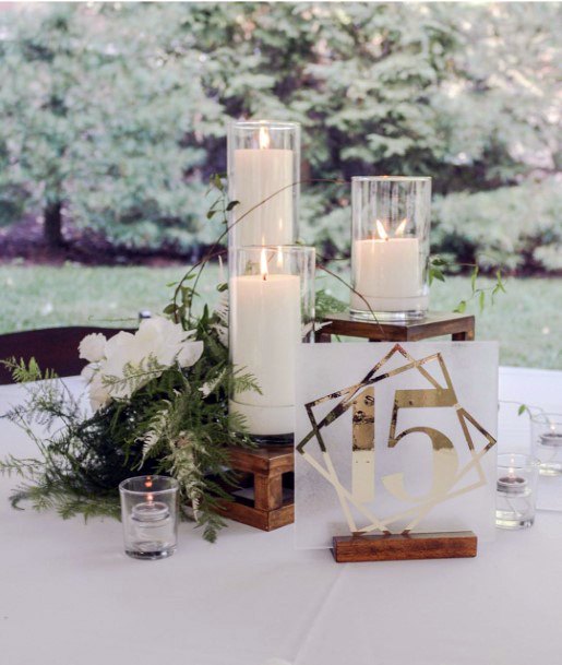 Simple Thick White Lit Candles Wedding Decorations