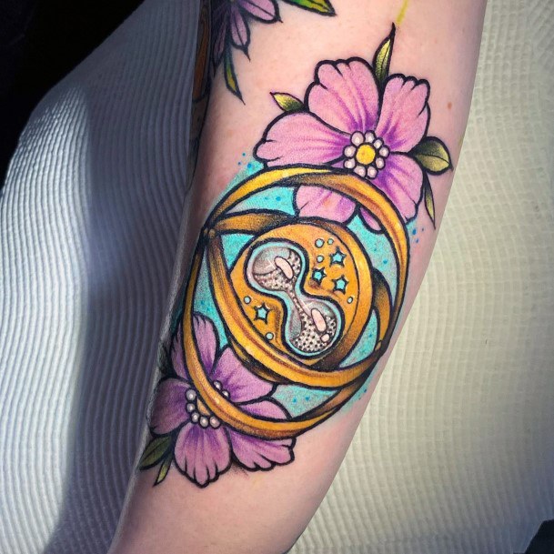 Simple Time Turner Tattoo For Women