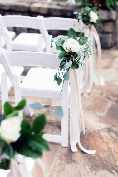 Simple White Rose Wedding Decor On Chairs