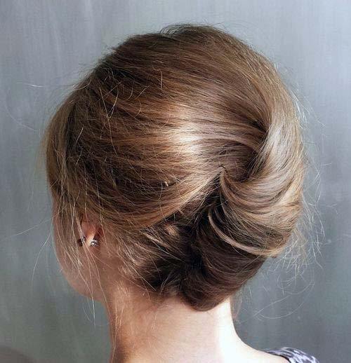 Simplistic And Polished Brown Highlighted French Shaped Updo Womens Hairstyle