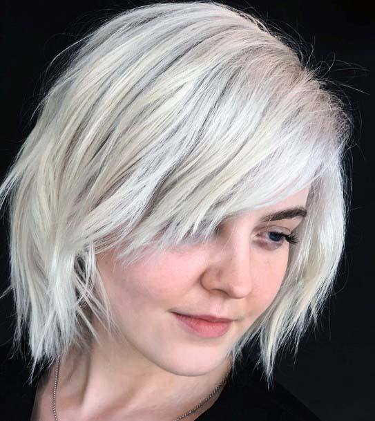 Simplistic Angled Bang Ashy Platinum Blonde Textured Bob Womens Hairstyle