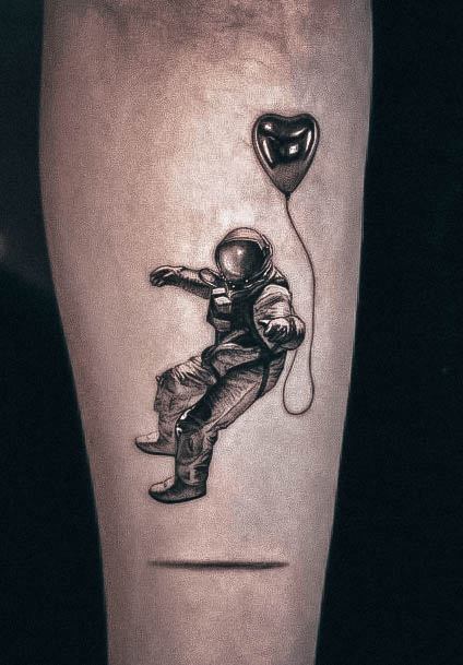 Simplistic Astronaut Tattoo For Girls